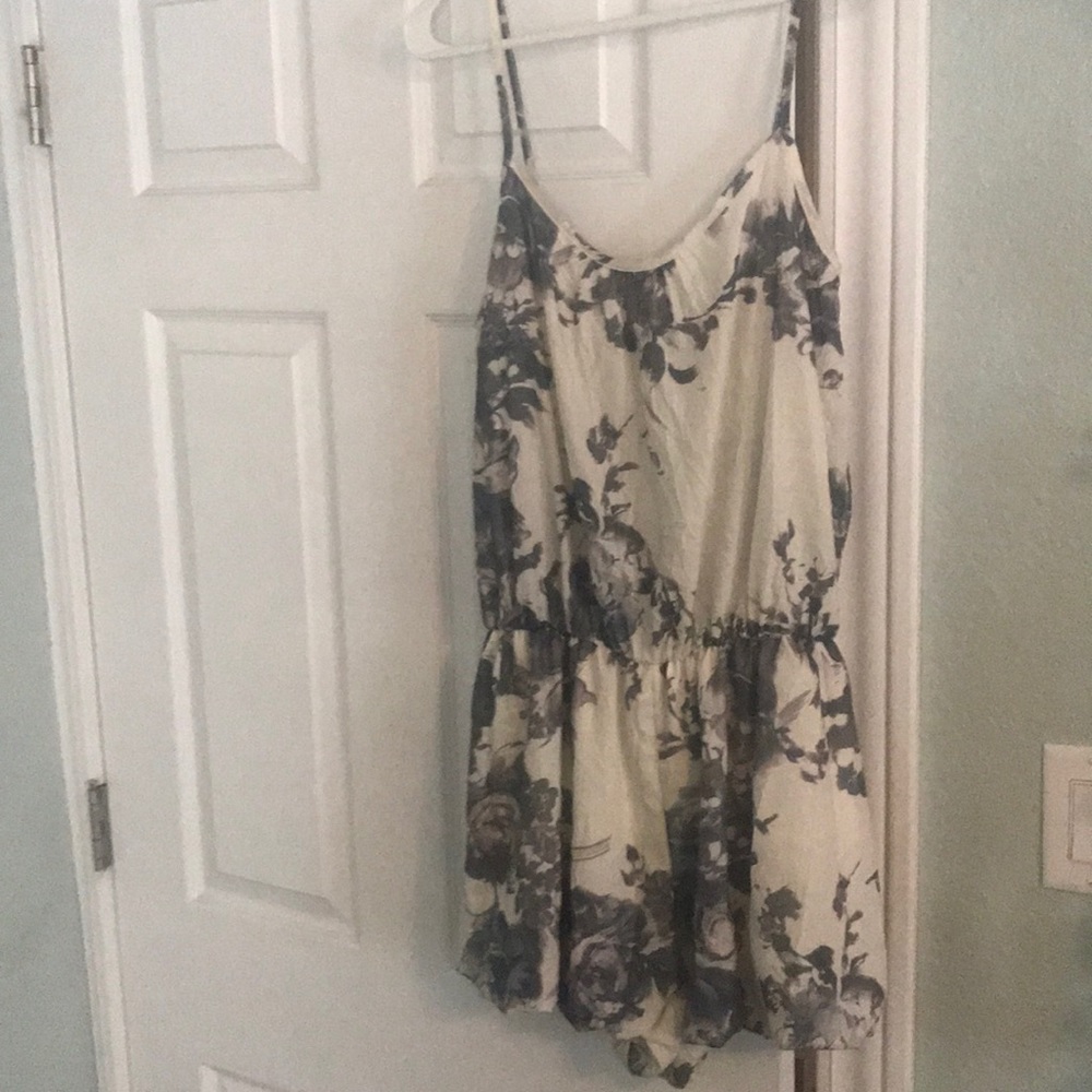 Off white romper with grey flowers